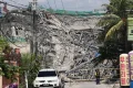 Building under construction in the Philippines collapses, possibly trapping dozens
