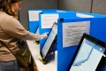Georgia’s vote-counting method will soon be banned. Lawmakers will try to find a fix this week