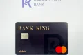 Bank card program to steer cash payments to single mothers in government housing