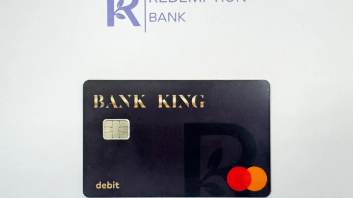 Bank card program to steer cash payments to single mothers in government housing